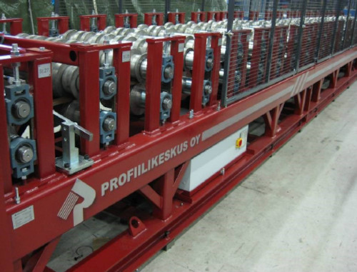 Electrical panel underneath a roll forming machine