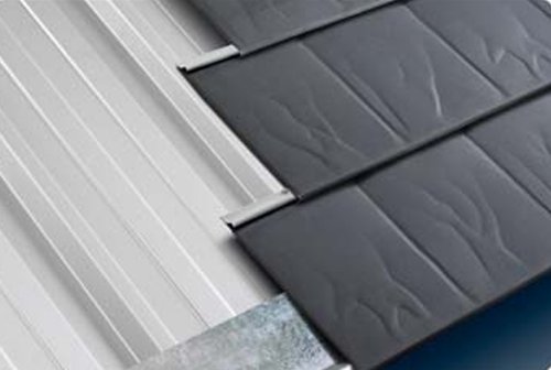 The slate style roof panel is a sheet metal panel that combines the looks of a traditional slate roof with all the advantages of a modern metal roof